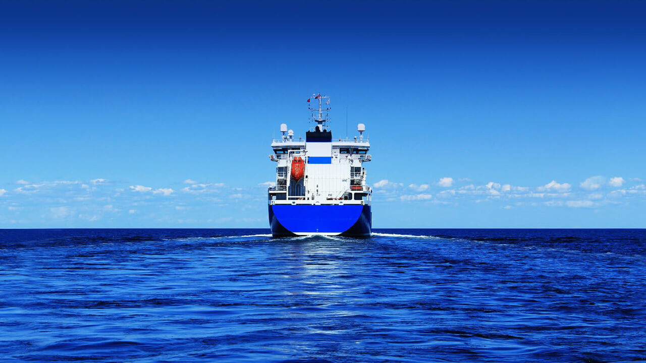 Ship sailing back to sea after dry dock service